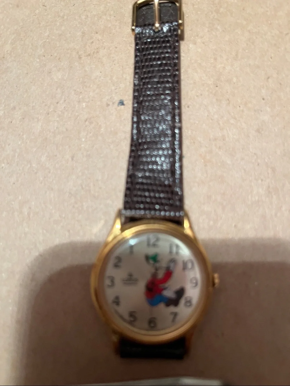 Gold tone vintage unisex Goofy watch by LORIS DISNEY